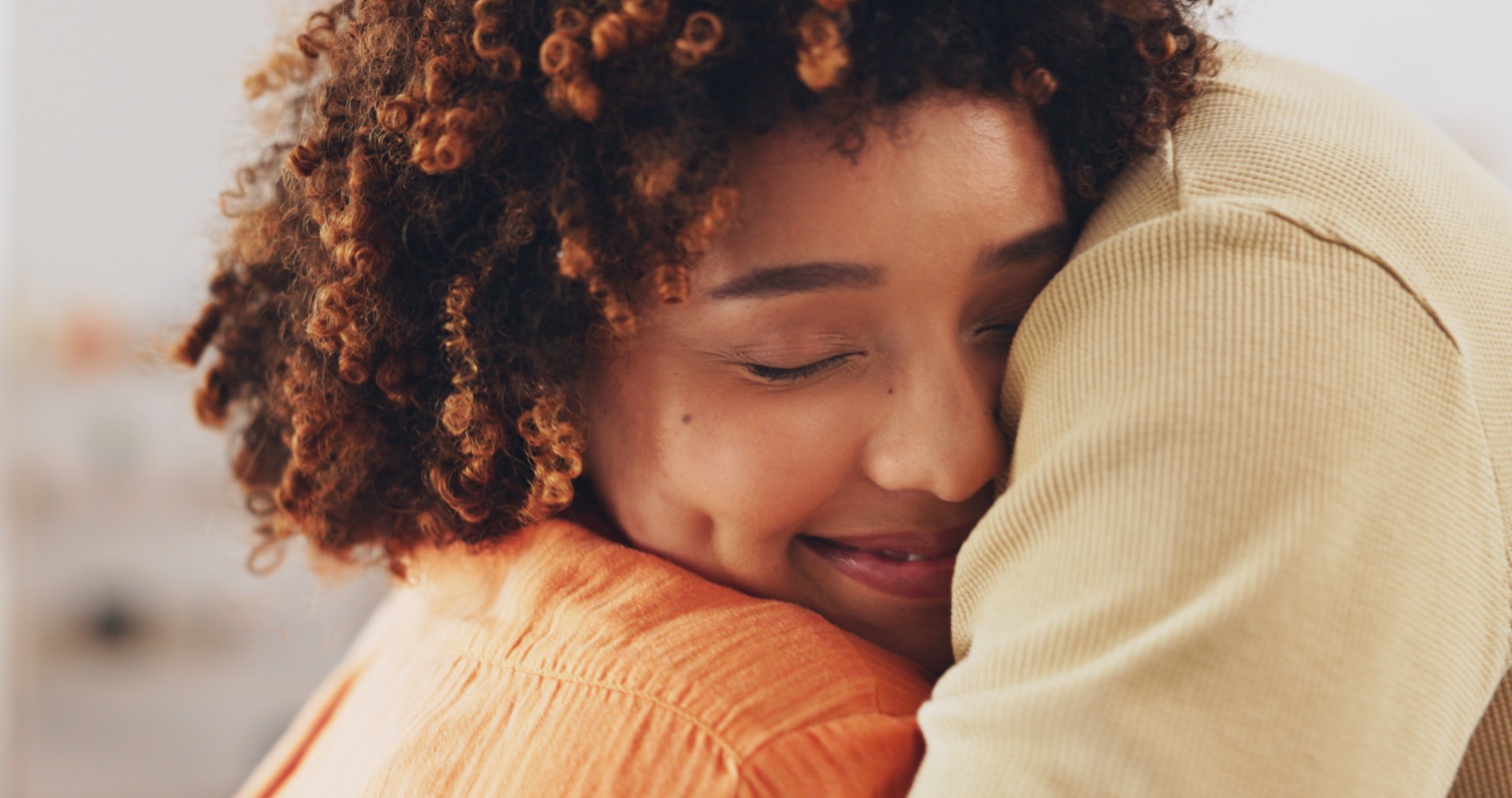 hug-house-and-a-couple-embracing-with-a-smile-co-2023-11-27-05-24-16-utc (Large)